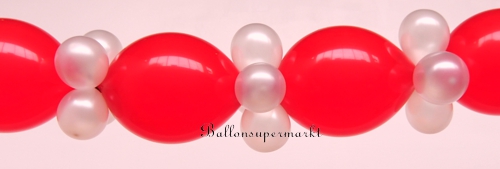 Girlande aus roten und weißen Luftballons
