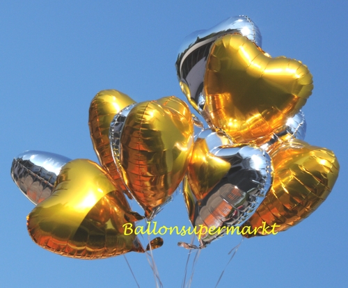 Goldene und Silberne Herzluftballons aus Folie mit Helium-Ballongas
