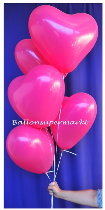Grosse-herzluftballons-hot-pink-mit-helium-ballontraube