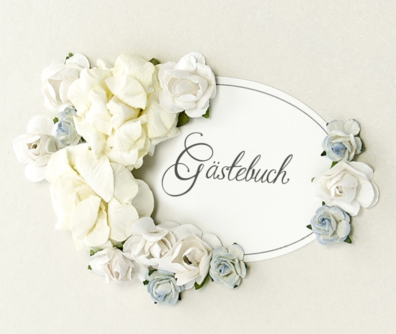 Hochzeits-Gaestebuch-cremefarben-mit-Rosen-Dekoration-zur-Hochzeit-detailansicht