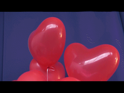 Rote Herzluftballons mit Ballongas Helium zur Hochzeit