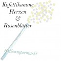 Konfettikanone mit weißen Herzen und cremefarbenen Rosenblättern