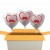 3 Weiße, herzförmige Luftballons "Alles Gute zur Rubinhochzeit", 40 Jahre" , inklusive Helium