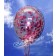 Großer Konfetti-Ballon mir pinkfarbenem Glitzerkonfetti gefüllt