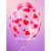 Transparenter-Luftballon-mit-roten-Herzchen-zur-Hochzeit