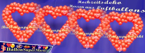 Hochzeit-Dekoration-Herz-aus-Luftballons-Farbe-Rot-mit-Tuellstoff